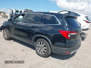 2020 Honda Pilot EX-L with VIN 5FNYF5H59LB014225, listed as a IAAI auction lot 41689776 with 90,994 mi miles. Bid and sale history available at carsss.com. Image 3.