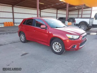 2011 Mitsubishi Outlander Sport ES with VIN JA4AP3AU8BZ009024, listed as a IAAI auction lot 41486821 with 221,044 mi miles. Bid and sale history available at carsss.com. Image 1.