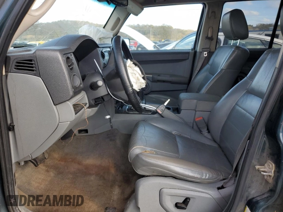 2006 Jeep Commander with VIN 1J8HH48N46C133122, listed as a Copart auction lot 80821094 with 216,412 mi miles and Salvage Title. Bid and sale history available at carsss.com. Image 7.