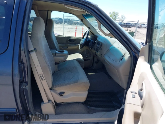 2000 Ford F-150 XL with VIN 1FTRX18LXYNB41132, listed as a IAAI auction lot 42173717 with Not provided miles and . Bid and sale history available at DreamBid. Image 5.