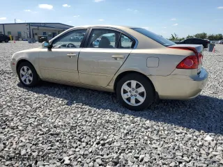 2008 Kia Optima LX with VIN KNAGE123385258036, listed as a Copart auction lot 52853485 with 147,314 mi miles and Non Repairable. Bid and sale history available at carsss.com. Image 2.