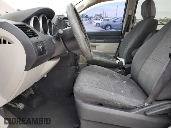 2008 Dodge Grand Caravan SE with VIN 2D8HN44H48R680046, listed as a Copart auction lot 42169125 with 198,035 mi miles and Salvage Title. Bid and sale history available at DreamBid. Image 7.