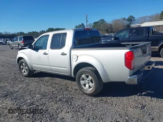 2013 Nissan Frontier SV with VIN 1N6AD0EV6DN720356, listed as a IAAI auction lot 41694570 with 243,279 mi miles and . Bid and sale history available at DreamBid. Image 3.