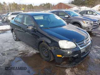 2009 Volkswagen Jetta S z VIN 3VWJZ71K29M082792, wystawiony jako IAAI lot #41682882 z przebiegiem 109 699 mil mil oraz . Historia ofert i sprzedaży dostępna na DreamBid. Obrazek 1.