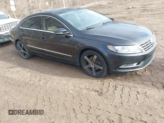 2014 Volkswagen CC Sport with VIN WVWBP7AN4EE534247, listed as a IAAI auction lot 41542076 with 119,199 mi miles and . Bid and sale history available at DreamBid. Image 1.