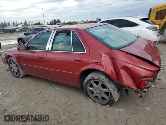 2002 Cadillac Seville Touring STS z VIN 1G6KY54902U132357, wystawiony jako Copart lot #42008795 z przebiegiem 111 014 mil mil oraz Szkoda całkowita • Salvage title. Historia ofert i sprzedaży dostępna na DreamBid. Obrazek 2.