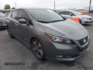 2018 Nissan LEAF SV z VIN 1N4AZ1CP0JC314973, wystawiony jako IAAI lot #42427324 z przebiegiem 75 711 mil mil oraz . Historia ofert i sprzedaży dostępna na DreamBid. Obrazek 1.