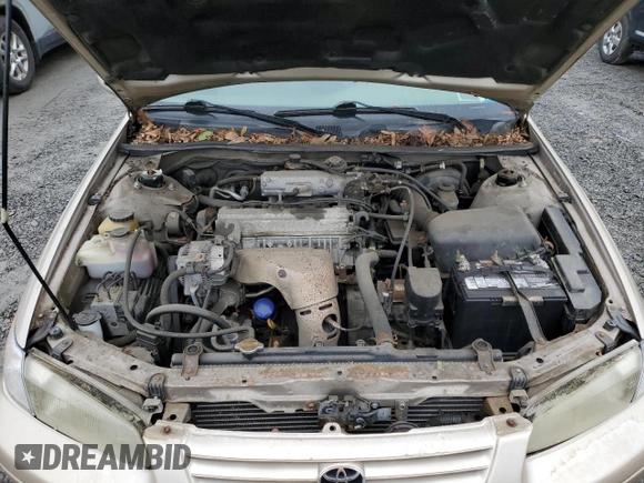 1997 Toyota Camry LE z VIN 4T1BG22K3VU819353, wystawiony jako Copart lot #58141275 z przebiegiem 32 935 mil mil oraz Czysty tytuł • Clean title. Historia ofert i sprzedaży dostępna na DreamBid. Obrazek 11.
