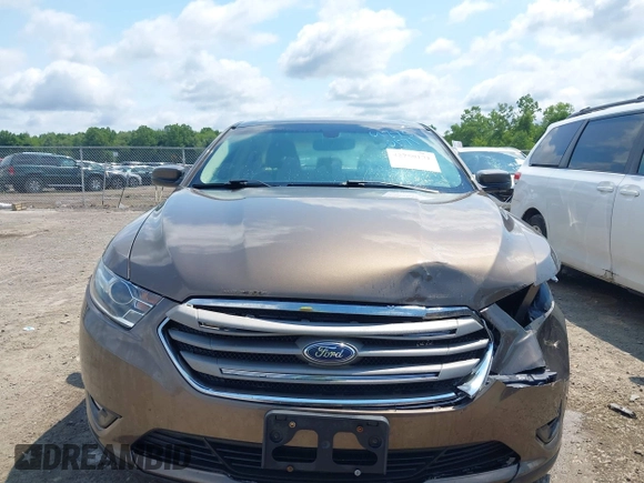 2015 Ford Taurus SEL with VIN 1FAHP2E82FG201994, listed as a IAAI auction lot 42750171 with 228,873 mi miles and . Bid and sale history available at DreamBid. Image 12.