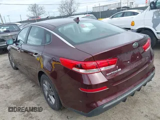 2020 Kia Optima LX with VIN 5XXGT4L37LG393078, listed as a IAAI auction lot 41444622 with 51,335 mi miles and . Bid and sale history available at DreamBid. Image 3.