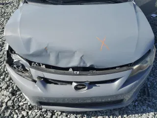 2012 Scion tC z VIN JTKJF5C78C3040542, wystawiony jako Copart lot #43595925 z przebiegiem 160 106 mil mil oraz Szkoda całkowita • Salvage title. Historia ofert i sprzedaży dostępna na DreamBid. Obrazek 13.