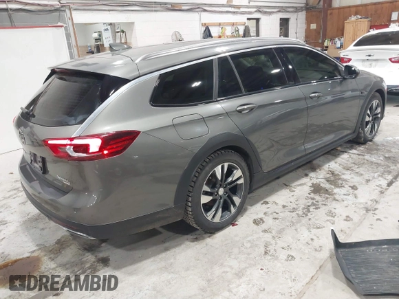 2018 Buick Regal Essence with VIN W04GV8SX5J1110895, listed as a IAAI auction lot 41524602 with 93,920 mi miles and . Bid and sale history available at DreamBid. Image 4.
