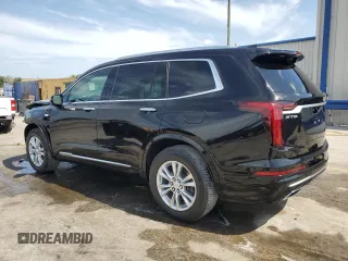 2023 Cadillac XT6 FWD Luxury z VIN 1GYKPAR45PZ187400, wystawiony jako Copart lot #54562335 z przebiegiem 16 953 mil mil oraz Szkoda całkowita • Salvage title. Historia ofert i sprzedaży dostępna na DreamBid. Obrazek 2.