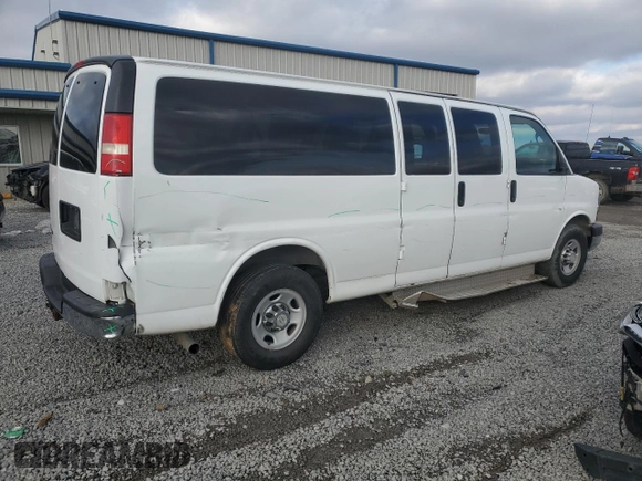 2014 Chevrolet Express Passenger LT with VIN 1GAZG1FG9E1108950, listed as a Copart auction lot 45370685 with 537,650 mi miles and Salvage title. Bid and sale history available at DreamBid. Image 3.