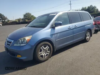 2006 Honda Odyssey EX-L with VIN 5FNRL38716B119994, listed as a Copart auction lot 60277815 with 144,904 mi miles and Salvage title. Bid and sale history available at DreamBid. Image 1.