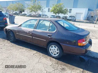 1999 Nissan Altima XE with VIN 1N4DL01D3XC209869, listed as a IAAI auction lot 41414580 with 175,076 mi miles. Bid and sale history available at carsss.com. Image 3.