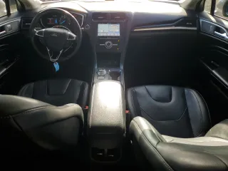 2019 Ford Fusion Titanium with VIN 3FA6P0K99KR217217, listed as a Copart auction lot 47590015 with 105,177 mi miles and Salvage Title. Bid and sale history available at carsss.com. Image 8.