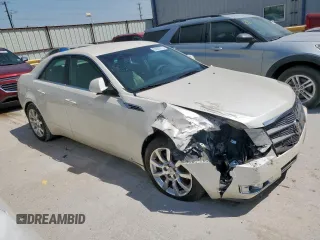 2009 Cadillac CTS RWD с VIN 1G6DF577790154494, выставлен на аукционе Copart как лот 53089275 с пробегом 272 141 миль миль и Списание • Salvage title. История ставок и продаж доступна на DreamBid. Изображение 4.