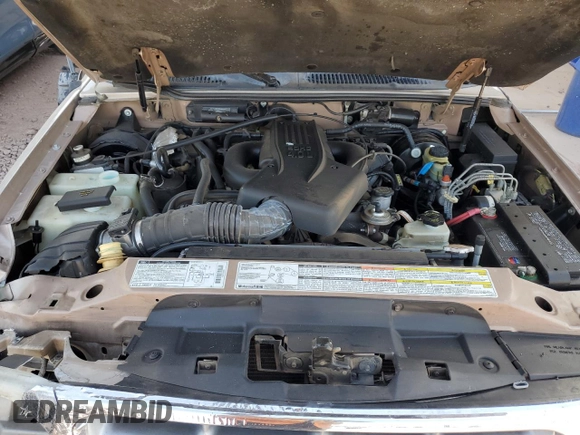 1998 Ford Explorer XL z VIN 1FMZU34E4WUA14628, wystawiony jako Copart lot #47477325 z przebiegiem 88 954 mil mil oraz Szkoda całkowita • Salvage title. Historia ofert i sprzedaży dostępna na DreamBid. Obrazek 13.