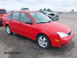 2007 Ford Focus S z VIN 1FAFP34NX7W307962, wystawiony jako IAAI lot #42281161 z przebiegiem 274 026 mil mil oraz . Historia ofert i sprzedaży dostępna na DreamBid. Obrazek 1.