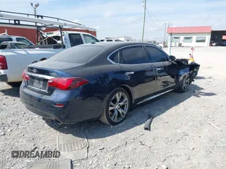 2015 Infiniti Q70 with VIN JN1BY1PP7FM601789, listed as a IAAI auction lot 41782519 with 140,158 mi miles and . Bid and sale history available at DreamBid. Image 4.