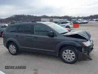 2017 Dodge Journey SE with VIN 3C4PDCABXHT694909, listed as a IAAI auction lot 41640828 with 188,657 mi miles and . Bid and sale history available at DreamBid. Image 13.