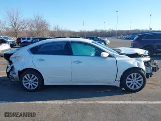 2015 Nissan Altima 2.5 SV with VIN 1N4AL3AP0FC409640, listed as a IAAI auction lot 41770590 with 149,851 mi miles. Bid and sale history available at carsss.com. Image 13.