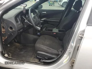 2019 Dodge Charger Police with VIN 2C3CDXATXKH627424, listed as a Copart auction lot 61445815 with 122,296 mi miles and Salvage title. Bid and sale history available at DreamBid. Image 7.