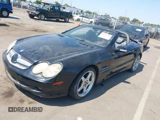 2003 Mercedes-Benz SL 500 z VIN WDBSK75F73F013272, wystawiony jako IAAI lot #42428315 z przebiegiem Nie podano mil oraz . Historia ofert i sprzedaży dostępna na DreamBid. Obrazek 2.