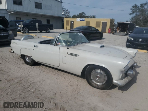 1956 Ford Thunderbird with VIN P6FH263430, listed as a Copart auction lot 75977804 with 52,420 mi miles and Salvage Title. Bid and sale history available at DreamBid. Image 4.