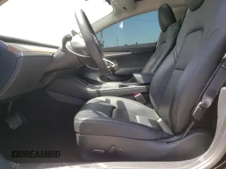 2023 Tesla Model 3 with VIN 5YJ3E1EA4PF558175, listed as a Copart auction lot 67586104 with 32,755 mi miles and Salvage title. Bid and sale history available at DreamBid. Image 7.