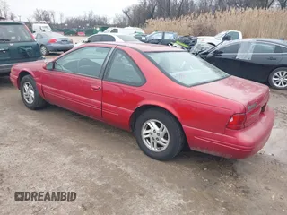 1997 Ford Thunderbird LX with VIN 1FALP6248VH134894, listed as a IAAI auction lot 41551957 with 136,435 mi miles and . Bid and sale history available at DreamBid. Image 3.