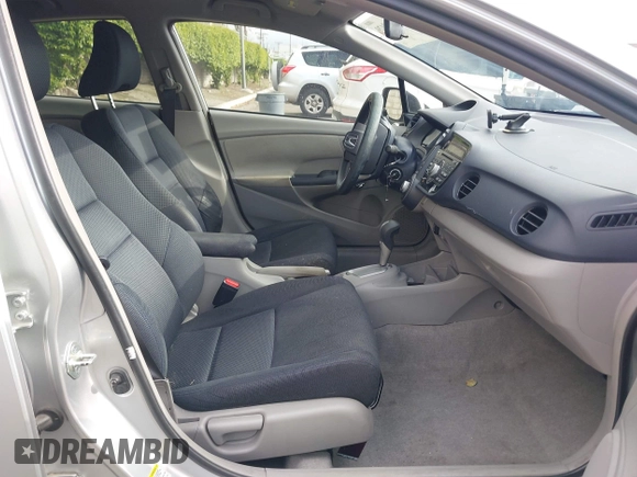 2010 Honda Insight EX with VIN JHMZE2H75AS003695, listed as a IAAI auction lot 42119429 with 90,901 mi miles and . Bid and sale history available at DreamBid. Image 5.
