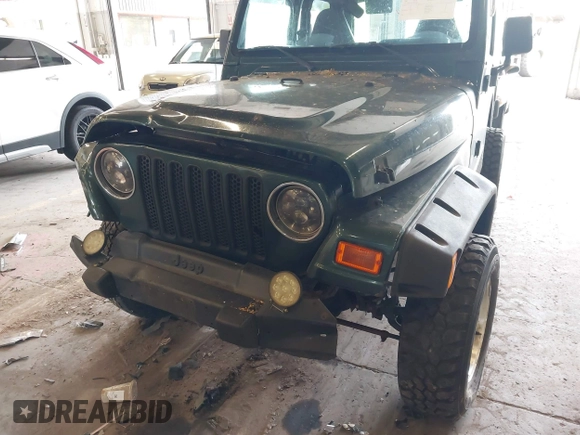 2000 Jeep Wrangler Sport with VIN 1J4FA49S8YP780104, listed as a IAAI auction lot 42095731 with Not provided miles and . Bid and sale history available at DreamBid. Image 12.