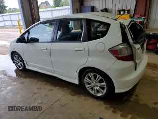 2009 Honda Fit Sport with VIN JHMGE88419S026712, listed as a Copart auction lot 51165865 with 54,586 mi miles and Salvage Title. Bid and sale history available at carsss.com. Image 2.