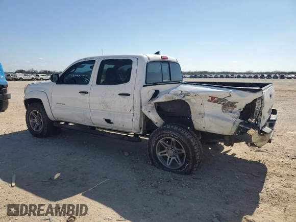 2014 Toyota Tacoma PreRunner with VIN 3TMJU4GN7EM159880, listed as a Copart auction lot 43932065 with 125,564 mi miles and Salvage Title. Bid and sale history available at carsss.com. Image 2.