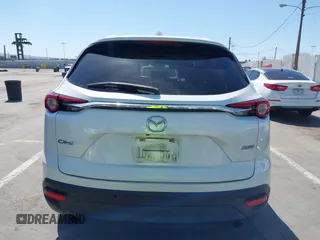 2019 Mazda CX-9 Touring with VIN JM3TCACY5K0306424, listed as a IAAI auction lot 42150466 with 95,166 mi miles and . Bid and sale history available at DreamBid. Image 16.