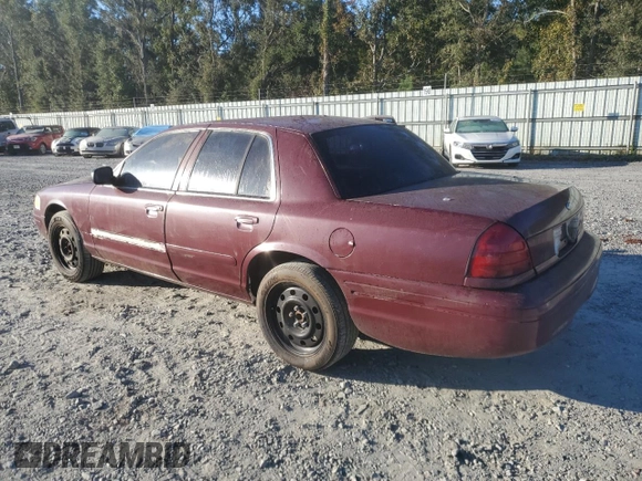 2006 Ford Police Interceptor with VIN 2FAFP71W06X165970, listed as a Copart auction lot 76293344 with 180,661 mi miles and Salvage title. Bid and sale history available at DreamBid. Image 2.