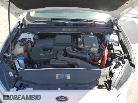 2013 Ford Fusion SE Hybrid z VIN 3FA6P0LU6DR325719, wystawiony jako Copart lot #55777715 z przebiegiem 152 478 mil mil oraz Szkoda całkowita • Salvage title. Historia ofert i sprzedaży dostępna na DreamBid. Obrazek 11.