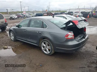 2014 Volkswagen Passat SE с VIN 1VWBN7A39EC085032, выставлен на аукционе IAAI как лот 41931302 с пробегом 193 425 миль миль и . История ставок и продаж доступна на DreamBid. Изображение 3.