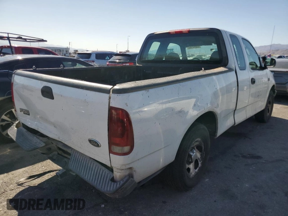 2004 Ford F-150 XL with VIN 2FTRX17204CA03494, listed as a Copart auction lot 59884165 with 226,973 mi miles and Salvage title. Bid and sale history available at DreamBid. Image 3.