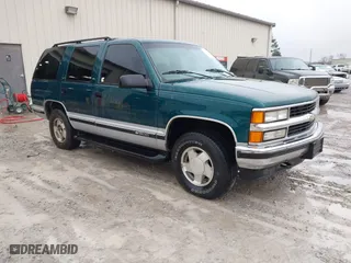 1996 Chevrolet Tahoe with VIN 1GNEK13R1TJ388054, listed as a IAAI auction lot 41368047 with 155,138 mi miles. Bid and sale history available at carsss.com. Image 1.
