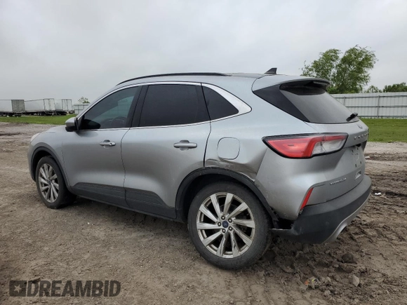2021 Ford Escape Titanium с VIN 1FMCU9J99MUB12020, выставлен на аукционе Copart как лот 51443365 с пробегом 63 504 миль миль и Списание • Salvage title. История ставок и продаж доступна на DreamBid. Изображение 2.