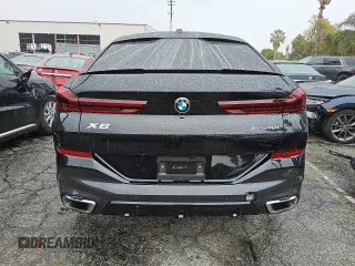 2025 BMW X6 xDrive40i with VIN 5UX33EX02S9W96445, listed as a Copart auction lot 49063285 with 0 mi miles and Clean Title. Bid and sale history available at carsss.com. Image 6.