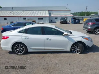 2015 Hyundai Azera z VIN KMHFG4JG3FA447672, wystawiony jako IAAI lot #42474930 z przebiegiem 125 425 mil mil oraz . Historia ofert i sprzedaży dostępna na DreamBid. Obrazek 13.