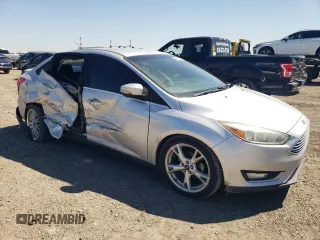 2015 Ford Focus Titanium with VIN 1FADP3J2XFL334046, listed as a Copart auction lot 48538825 with 98,322 mi miles and Non Repairable. Bid and sale history available at carsss.com. Image 4.