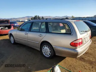 2000 Mercedes-Benz E-Class with VIN WDBJH65J6YB012332, listed as a Copart auction lot 80918284 with 186,616 mi miles and Clean Title. Bid and sale history available at carsss.com. Image 2.