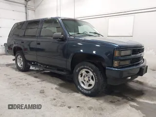 2000 Chevrolet Tahoe Z71 with VIN 1GNEK13R4YR156055, listed as a IAAI auction lot 42427554 with 208,512 mi miles and . Bid and sale history available at DreamBid. Image 1.