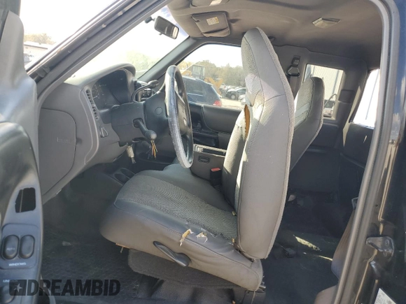 2001 Ford Ranger XLT Appearance with VIN 1FTYR14E81TA57597, listed as a Copart auction lot 45021525 with 161,838 mi miles and Salvage Title. Bid and sale history available at DreamBid. Image 7.