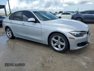 2013 BMW 3 Series 328i with VIN WBA3C1G52DNR49440, listed as a Copart auction lot 61546685 with 118,308 mi miles and Salvage title. Bid and sale history available at DreamBid. Image 4.